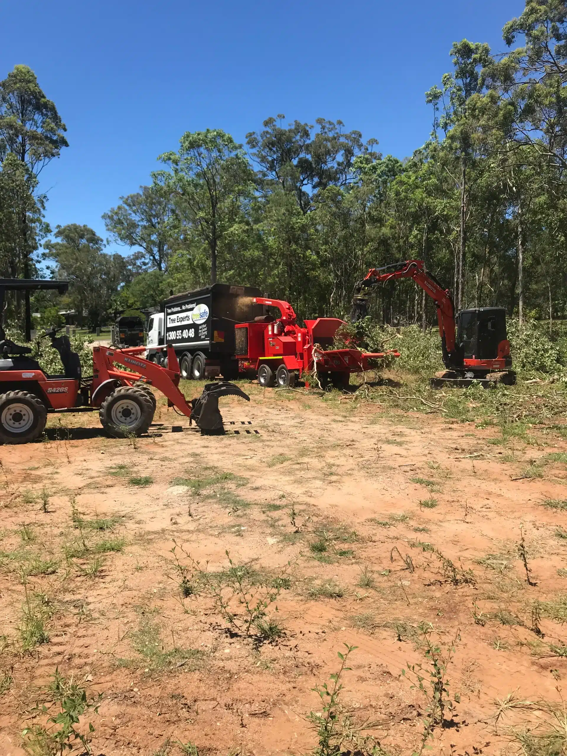 land-clearing-with-excavator-wood-chipper-and-treesafe-equipment