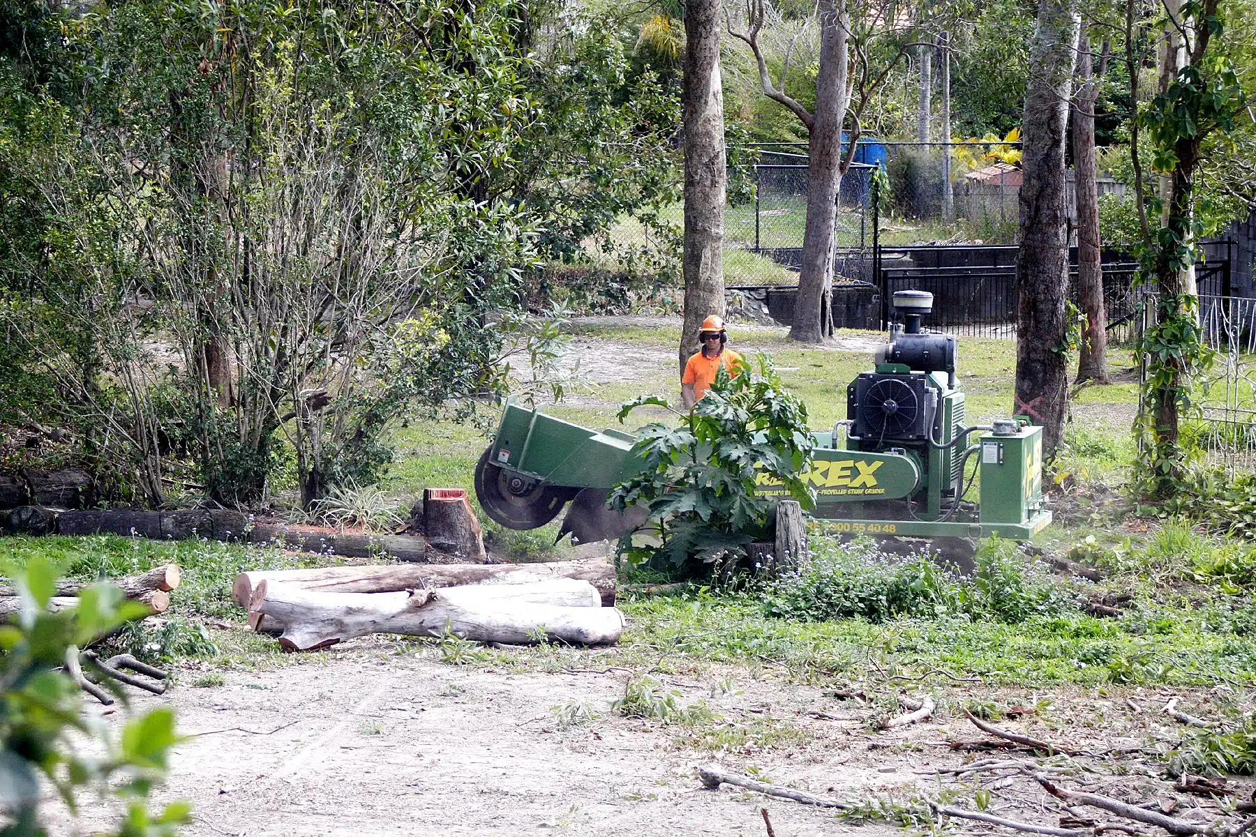 treesafe-stump-grinder-operating-beside-a-cleared-tree-trunk